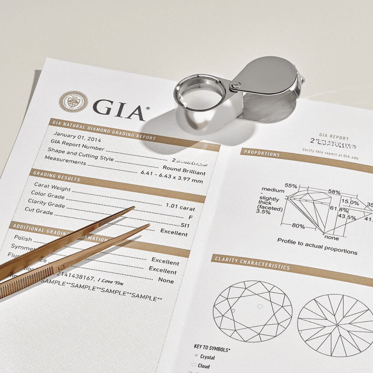 A grading report being scanned with a loupe and a GIA certificate